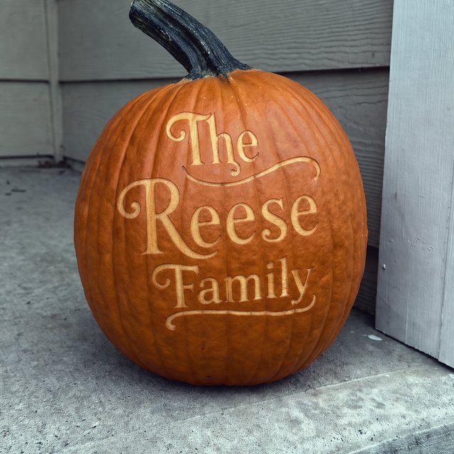 A pumpkin laser-engraved with the name Reese